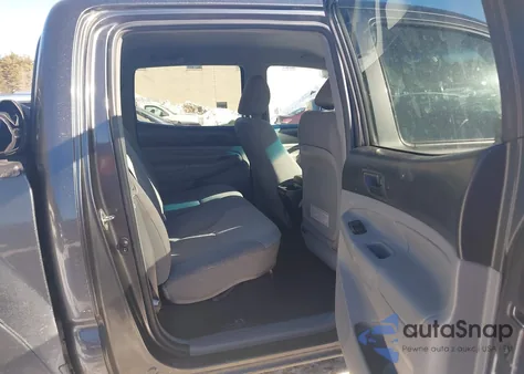 2015 Toyota Tacoma Base V6 z USA, uszkodzony, nr VIN 3TMLU4EN9FM182297